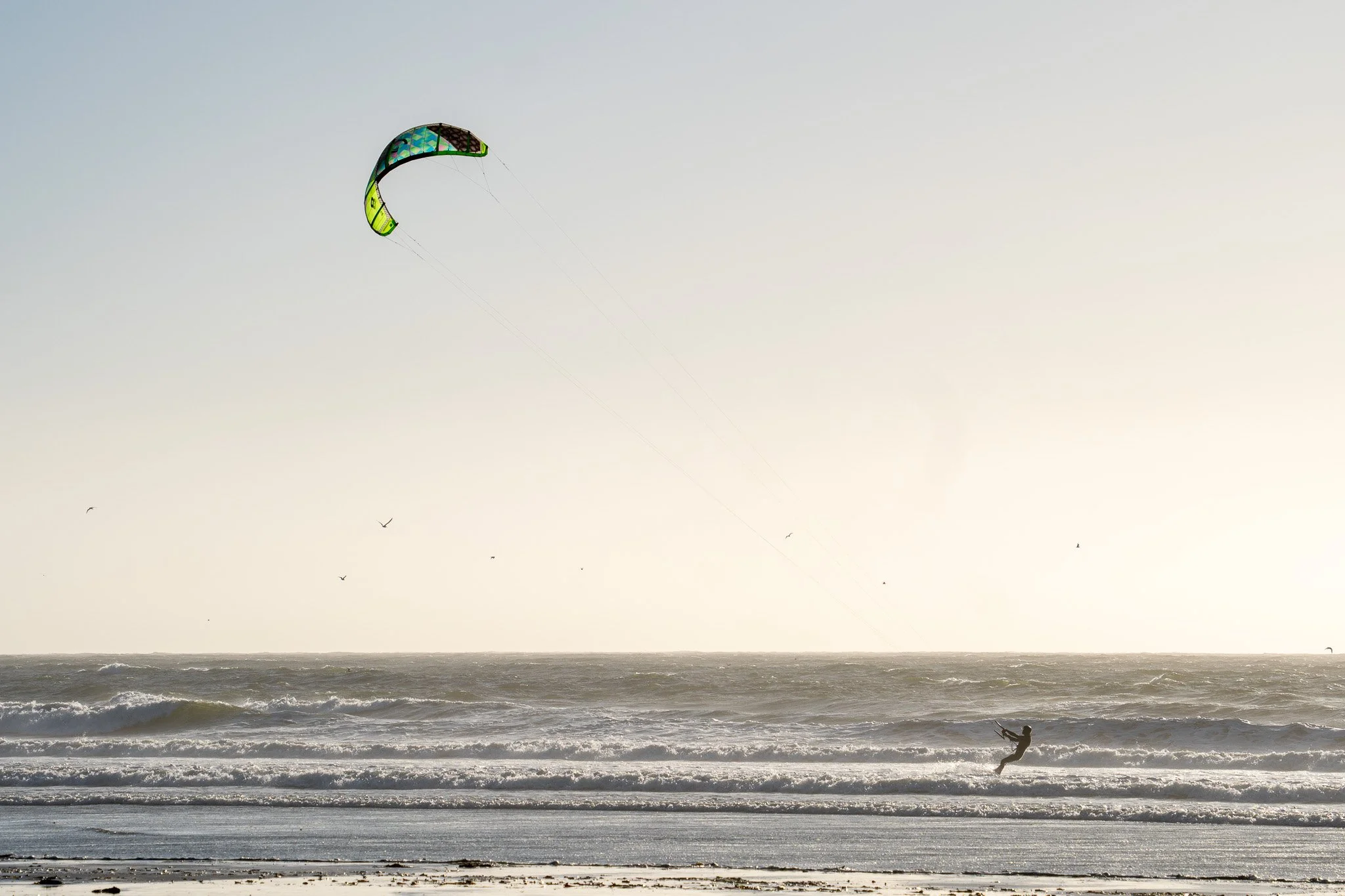 parasailing in morro rock, california, usa.jpg