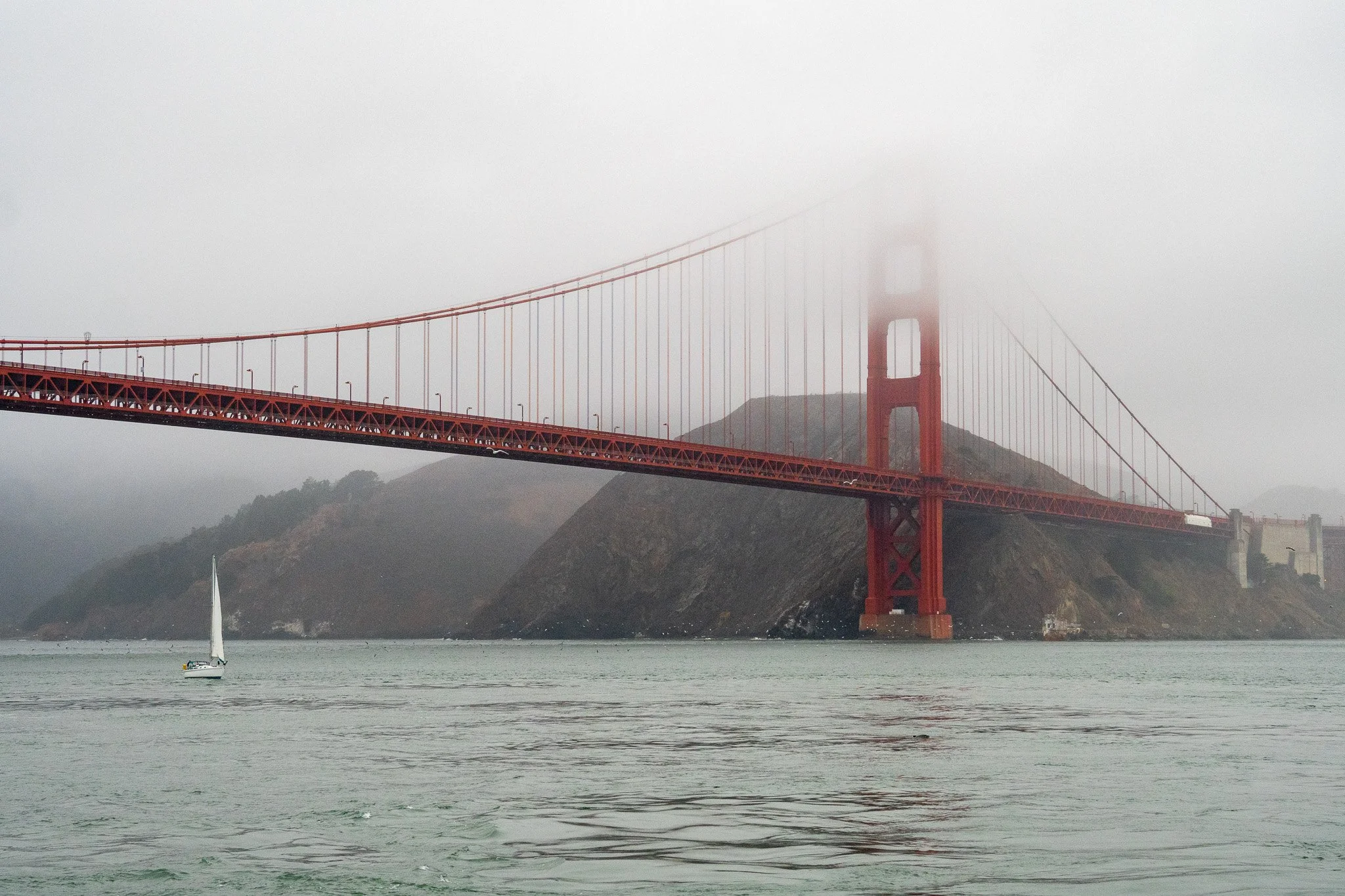 golden gate in clouds with sailboat, san francisco, california, usa.jpg