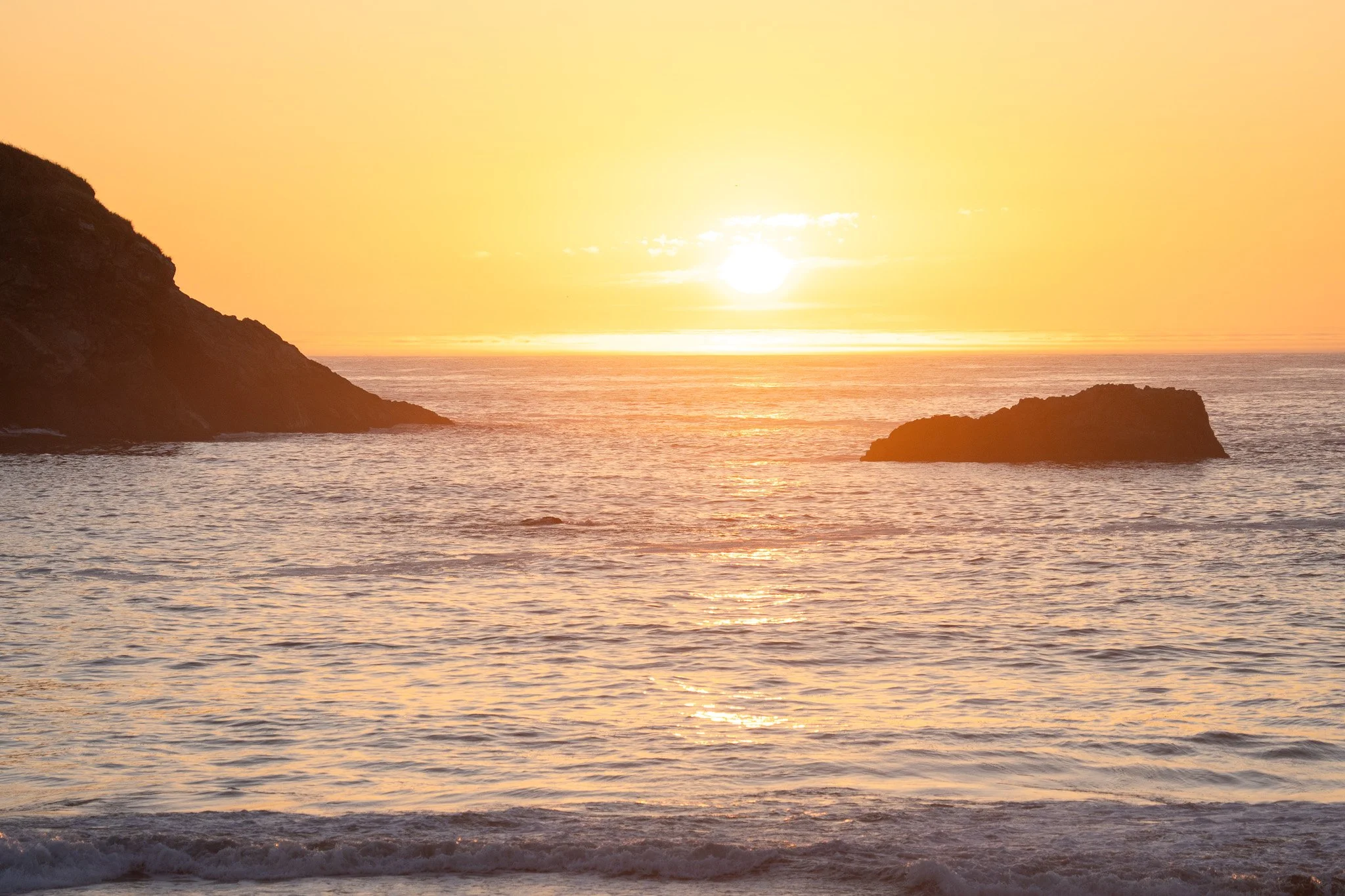 sun sets above ocean, harris beach, usa.jpg