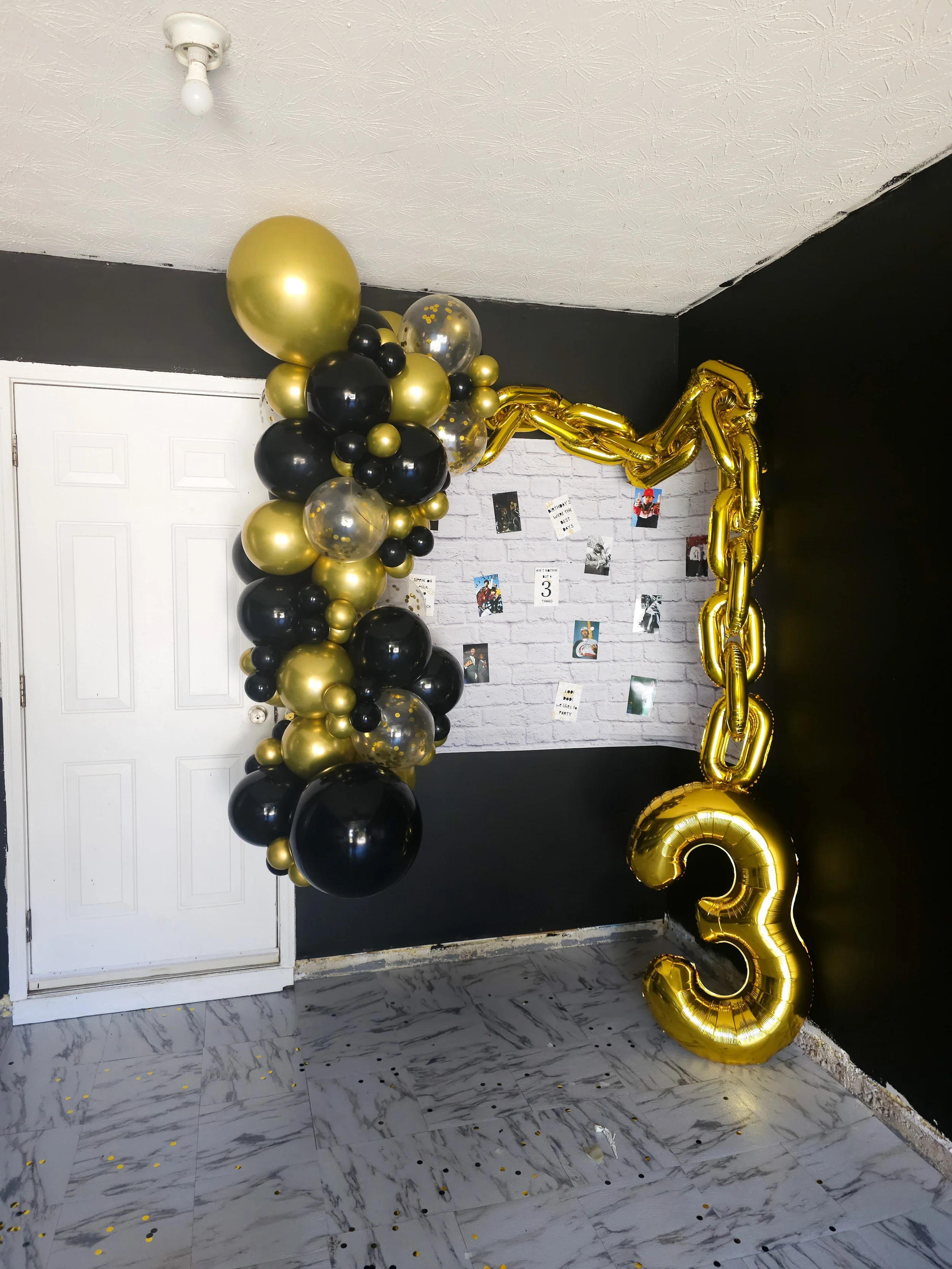 black and gold balloon garland for a kid's birthday party in Atlanta
