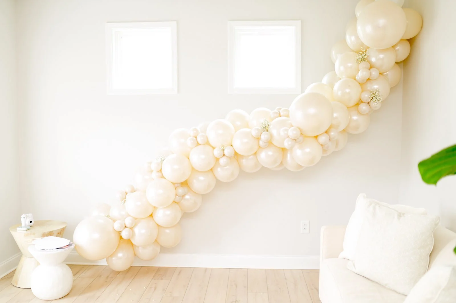 pearl sheen balloon garland with florals for a bridal shower in Atlanta