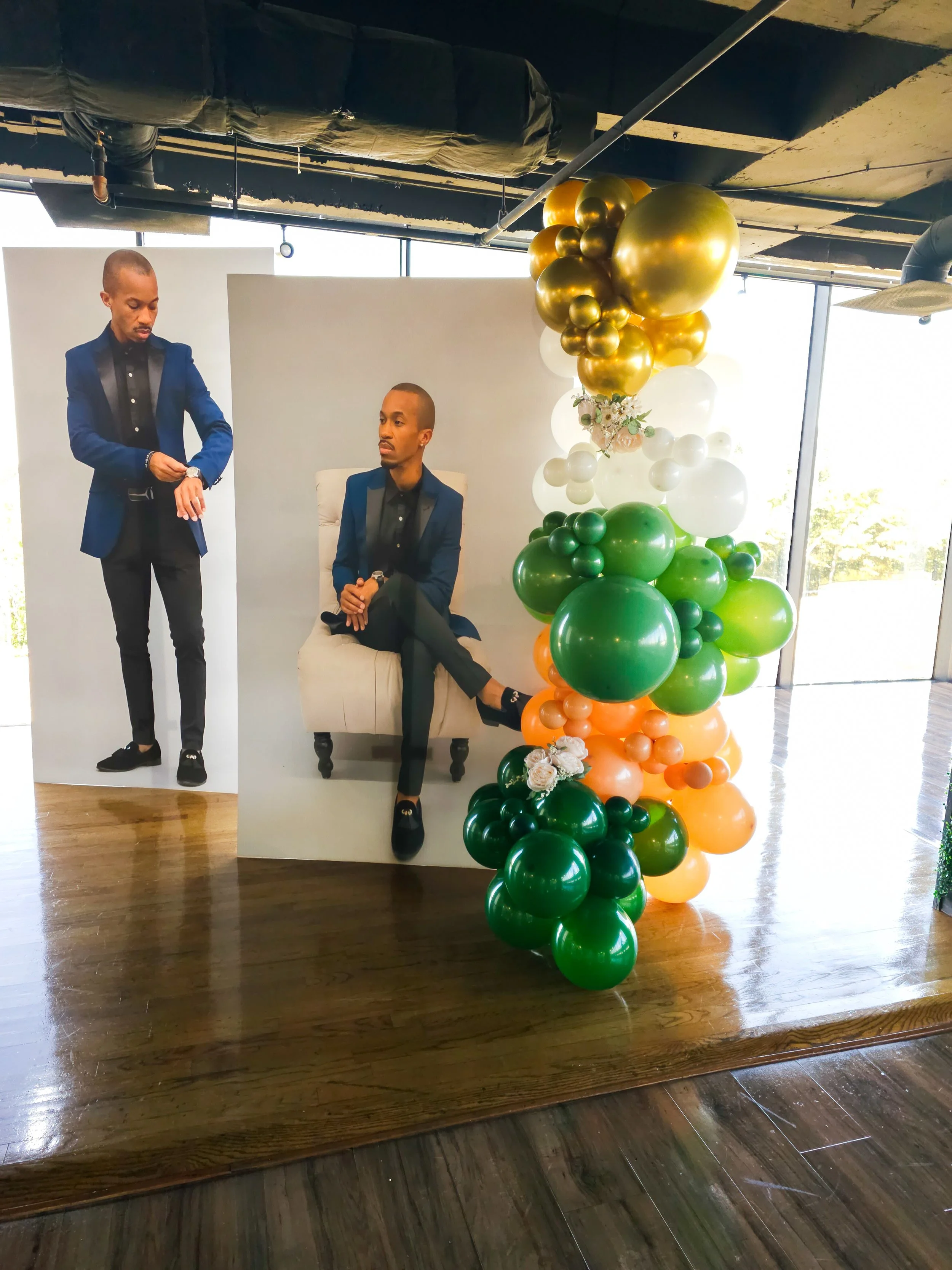 green, white, tan and gold standee balloon garland for a birthday party in Atlanta