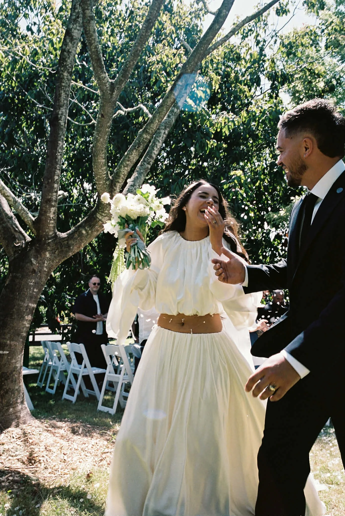 Bride glowing after receiving IV vitamin drip on her wedding day for a radiant pre-wedding glow, hydration, and natural calm before walking down the aisle.