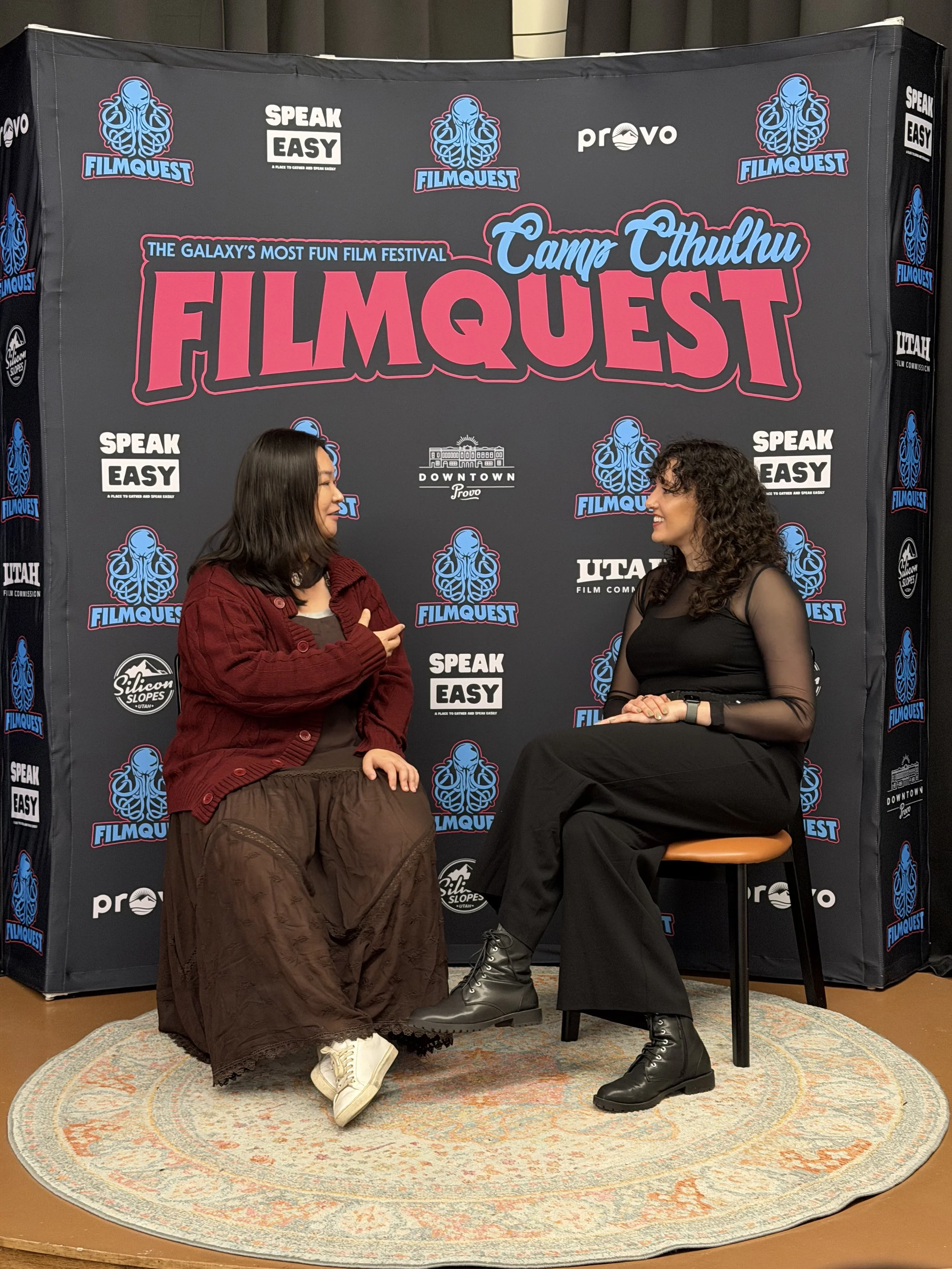 Horror Babe Show performing an interview with independent female filmmaker at FilmQuest Film Festival in Provo, Utah