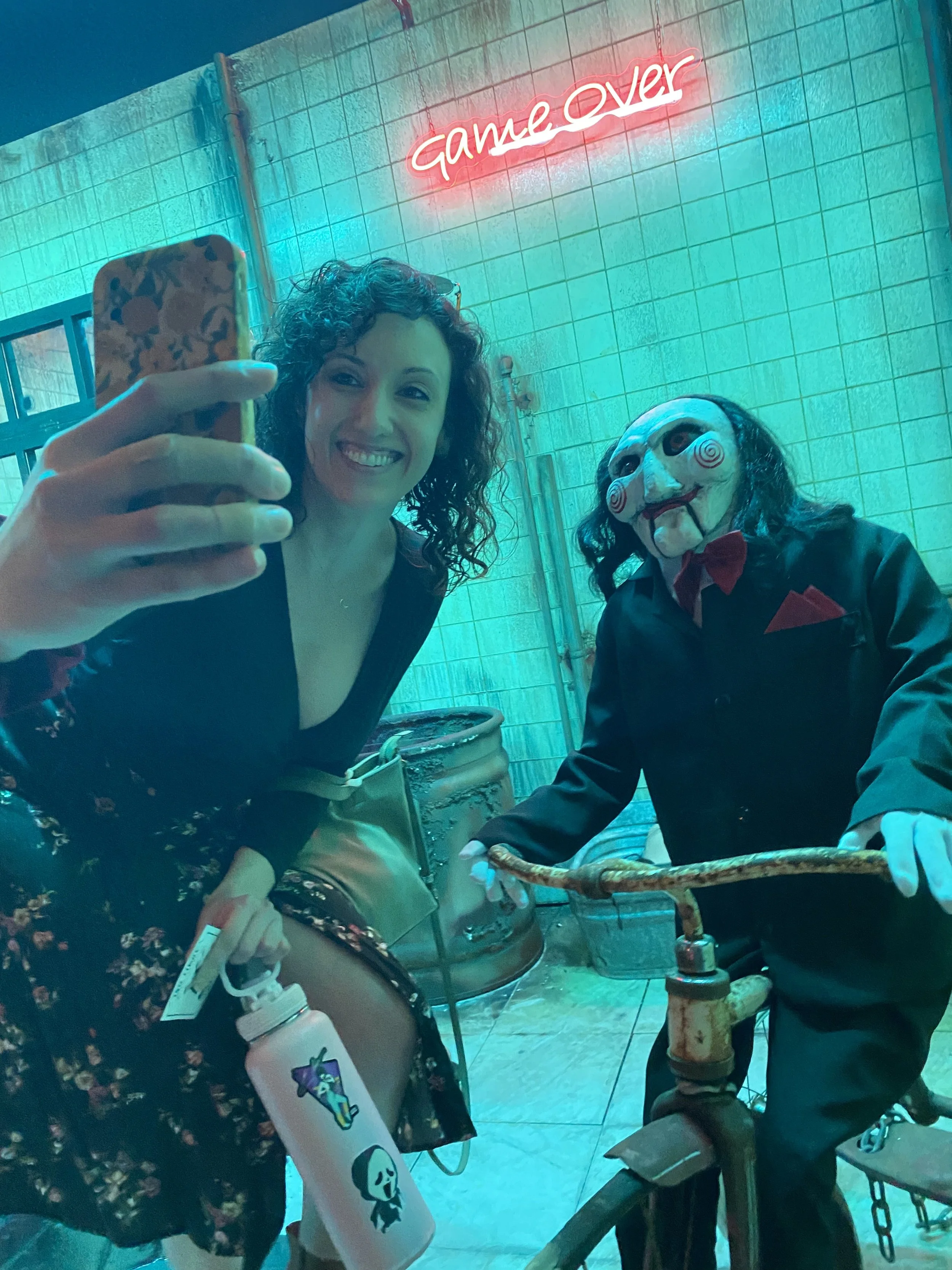 Chelsea poses with Jigsaw from the Sam franchise at the Mystic Museum in Burbank, CA