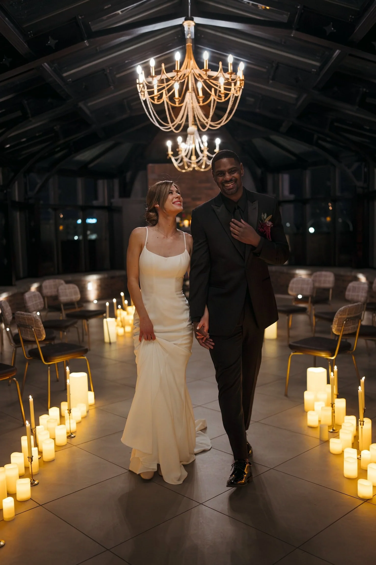 Scottsdale bride and groom candlelit ceremony candidly walking