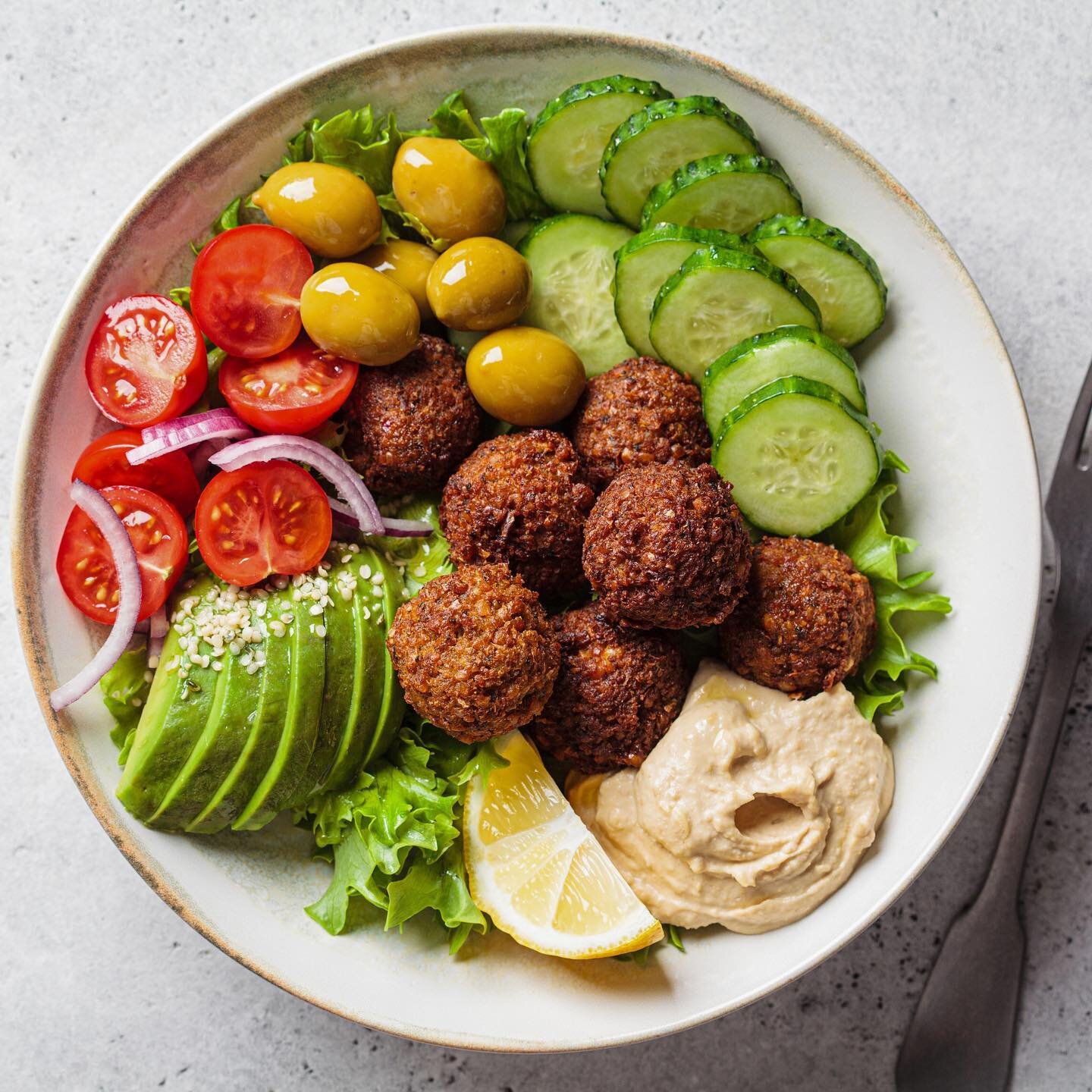 After class nourishment. 🥙🥗Treat yourself by making these yummy Falafel bowls served over a bed of mixed greens, cucumber, and tomato, a side of homemade tzatziki sauce and pita bread.

 Recipe is on our blog at beyogawellness.com/blog Enjoy!