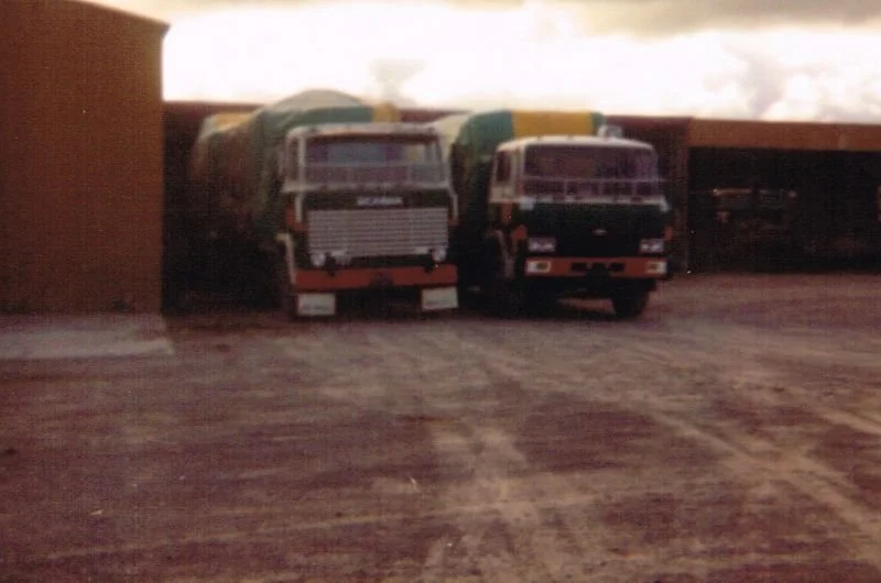 2-trucks-at-Fert-shed.jpg