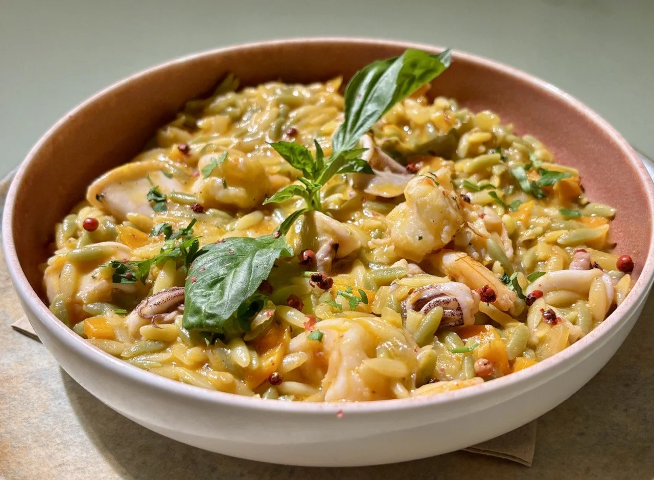Karma Greek Restaurant in Oia: One of our most peopler dish - SEAFOOD ORZO