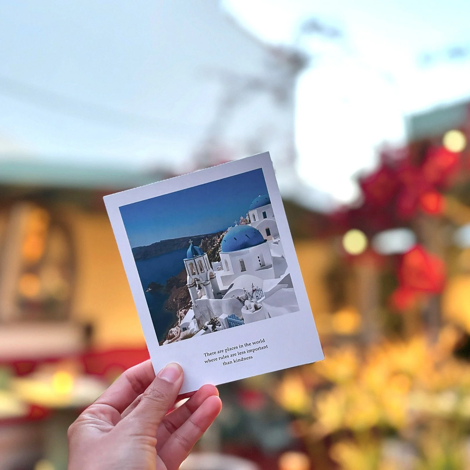 Take a little piece of Santorini home with you—free from Karma.
Capture the magic of sun-kissed streets, whitewashed walls, and unforgettable island moments with our complimentary Santorini postcard. A beautiful keepsake from your time at Karma, wher
