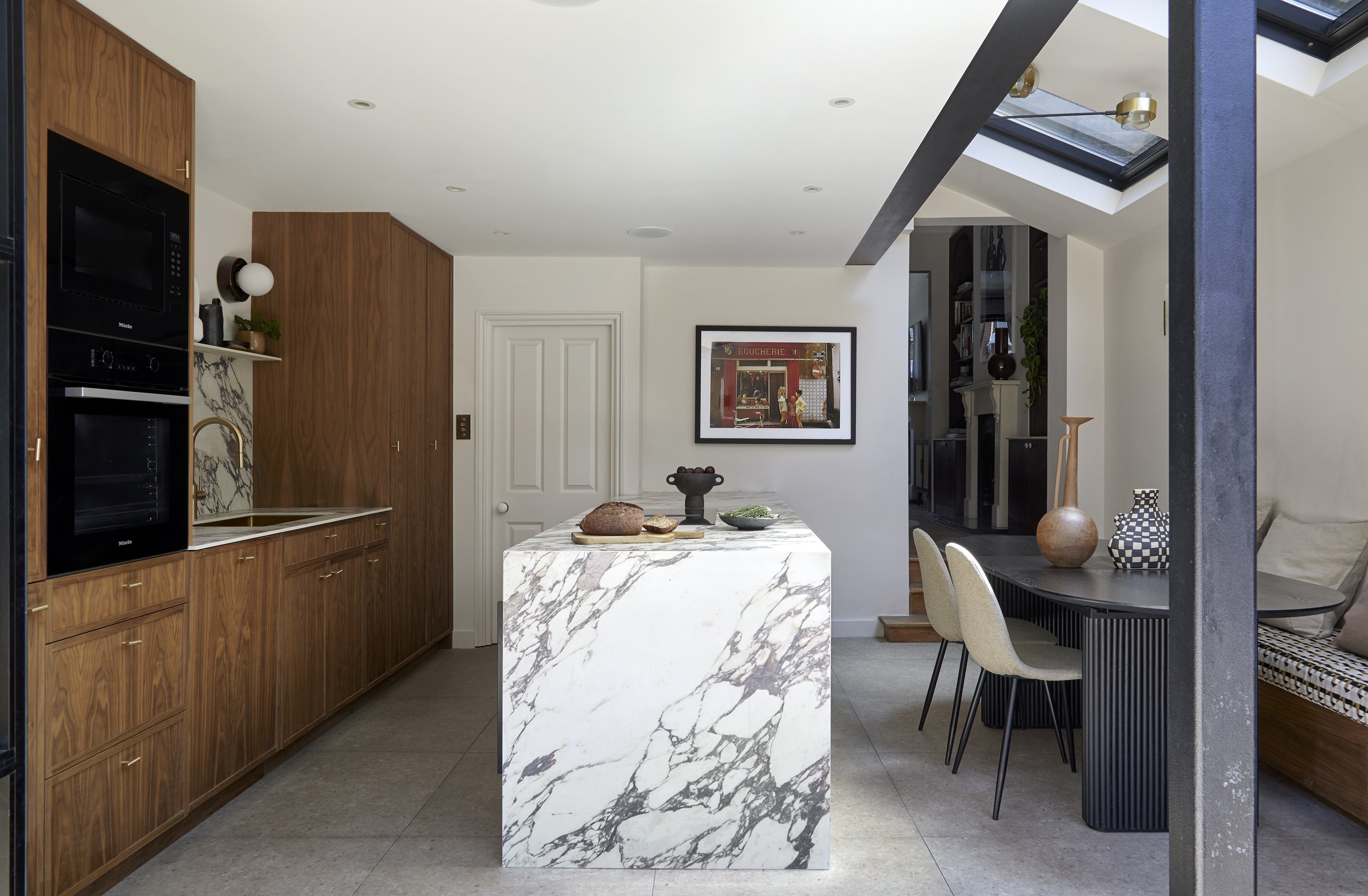 rear extension kitchen with viola calacata marble top and wood cabinet