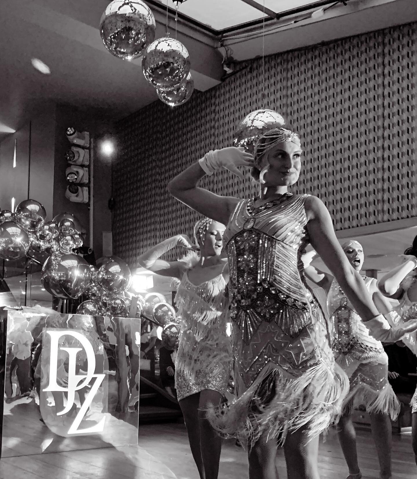 Channeling the spirit of the roaring twenties: where flapper girls shimmered like sequins and Gatsby dancers twirled through the night. Embracing the era of jazz and freedom, we dance through life with the same exuberance and sparkle. 

Venue; @woods