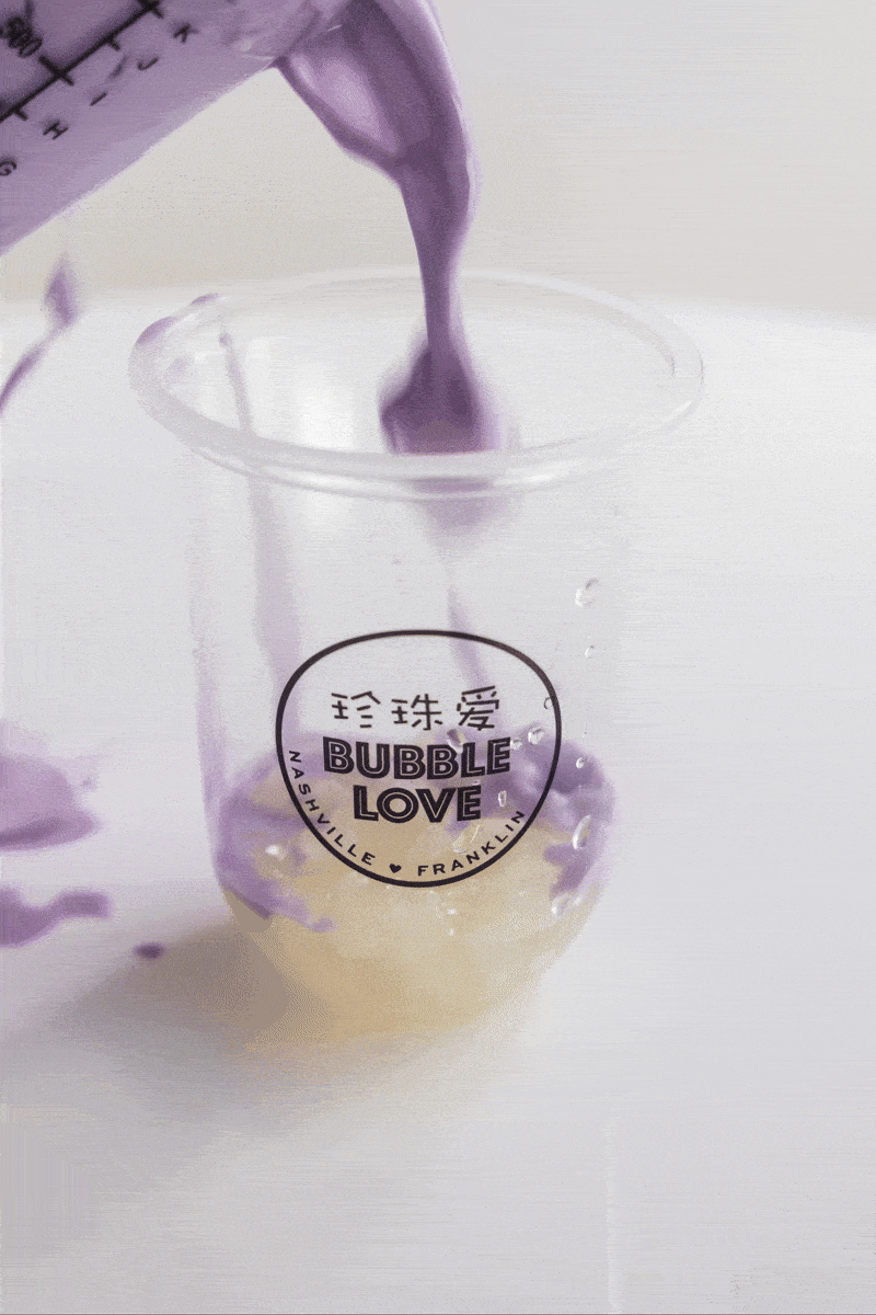 taro bubble tea pour with star lychee jellies