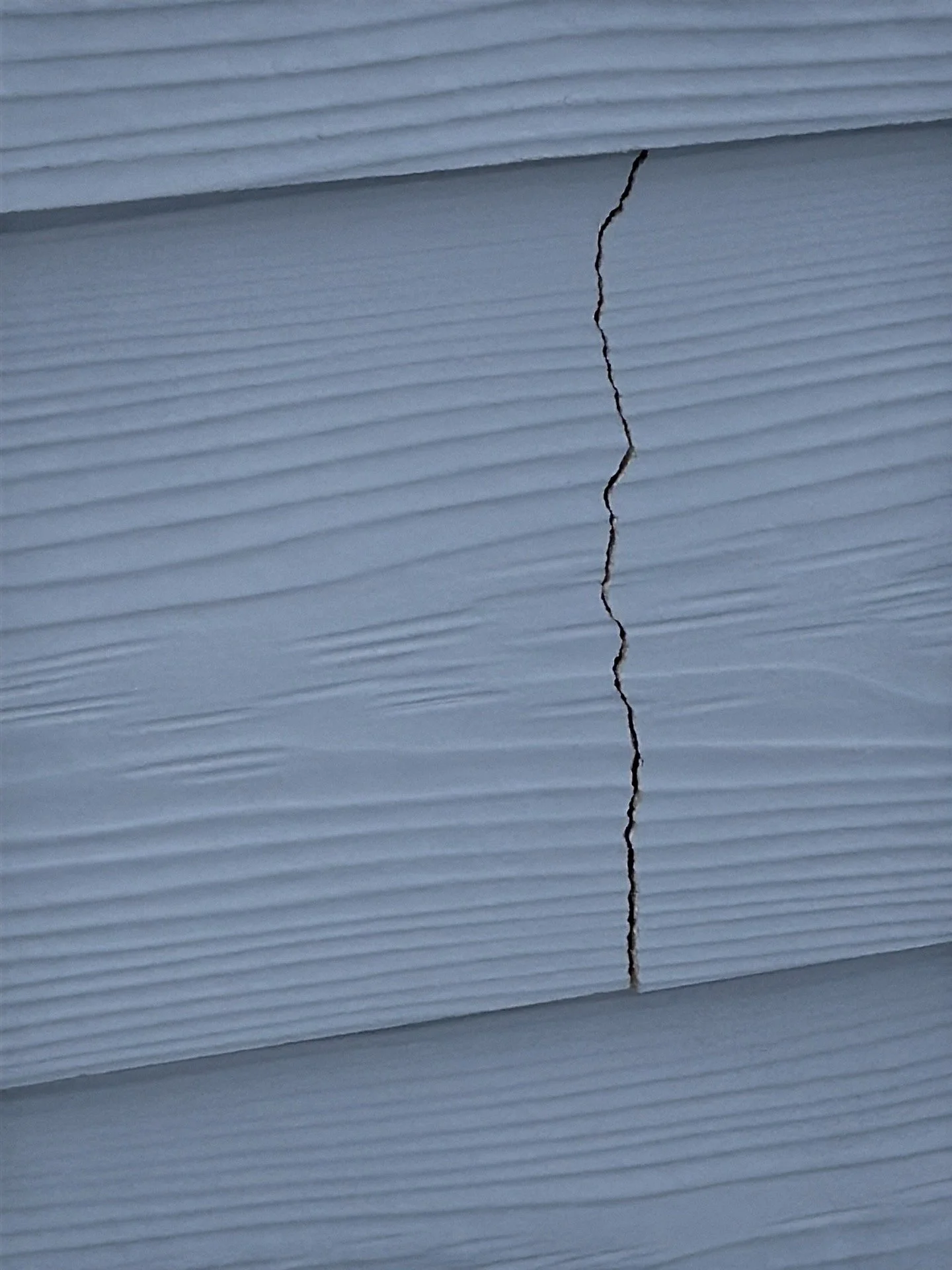Cracked Siding - on a 4 year old home