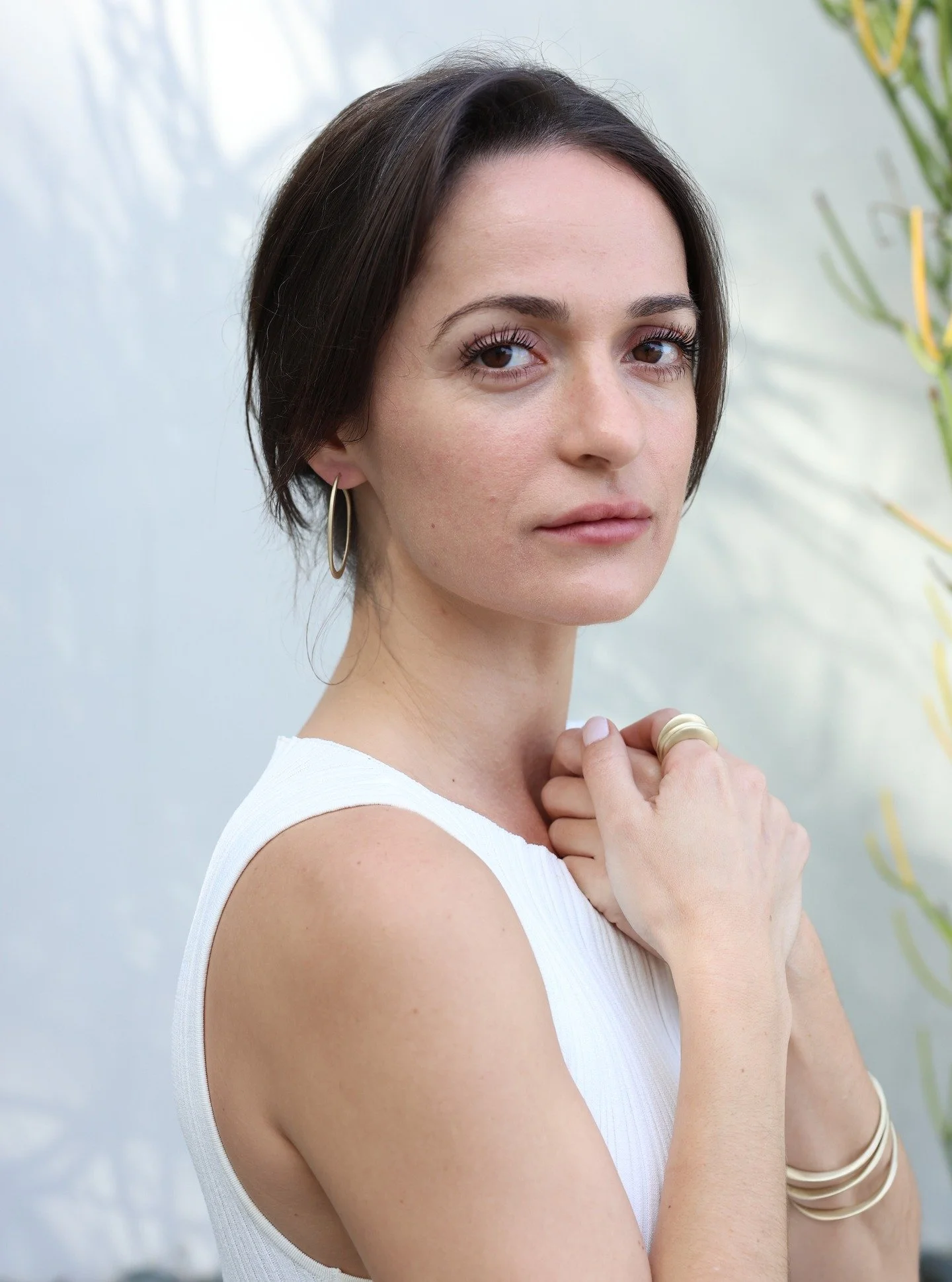 Simple details make the difference (beautiful eyes don't hurt either). @Chelsea wearing the Uccello earrings, Sable cuffs and Alma stack rings.