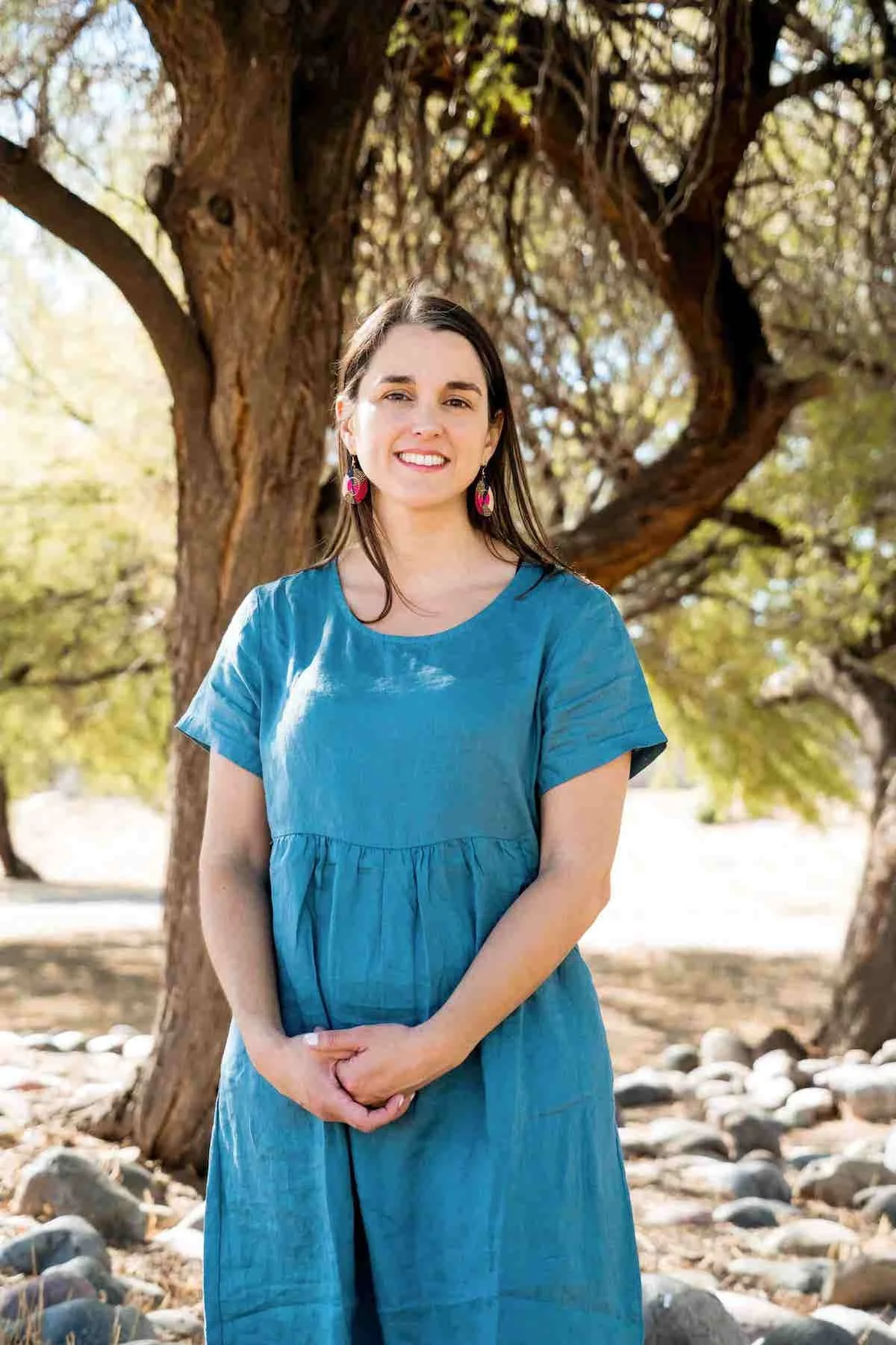 Phoenix therapist Tara Nicotra Clemente standing outside in a blue dress smiling