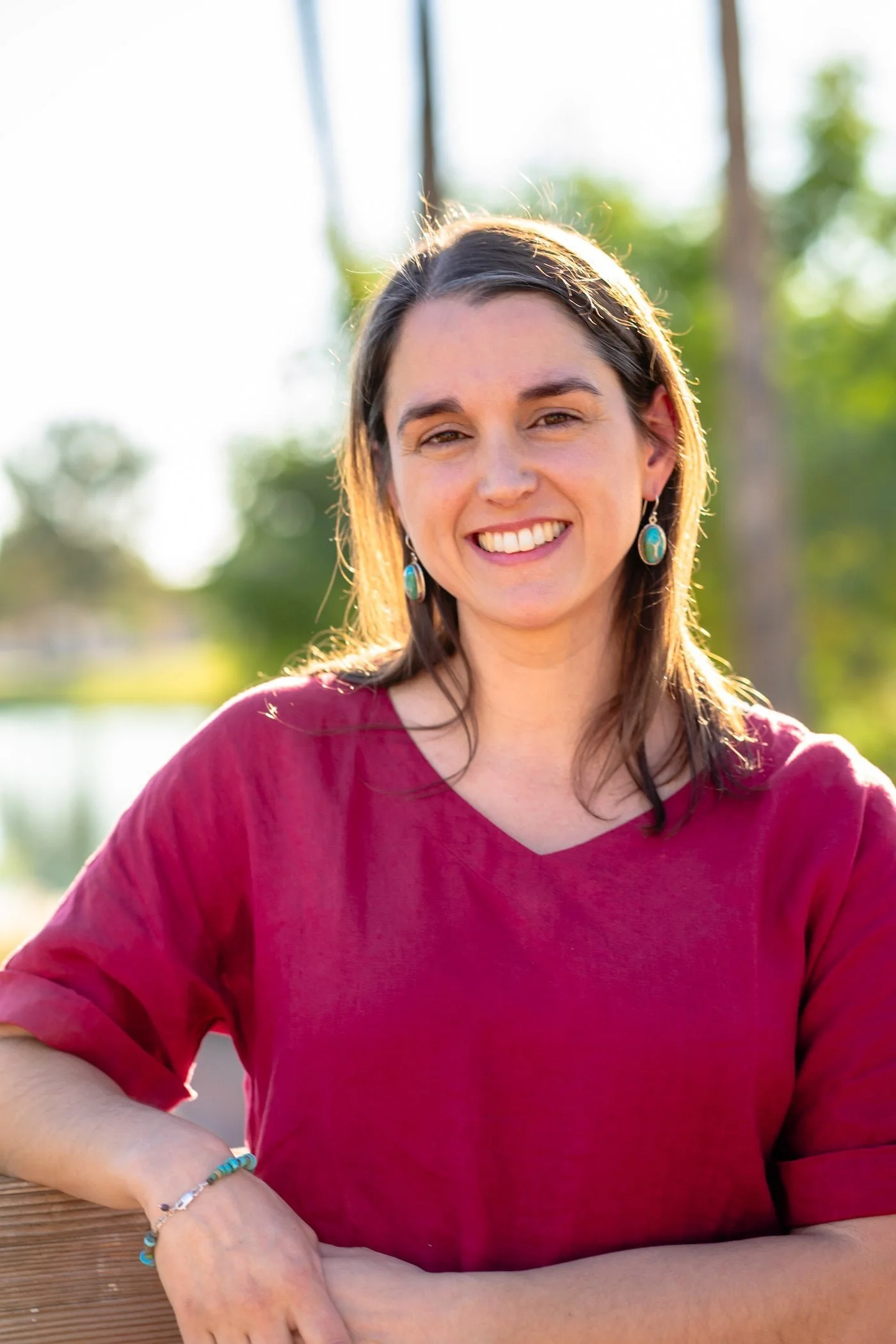 Phoenix therapist Tara Nicotra Clemente standing outside in the sunlight smiling