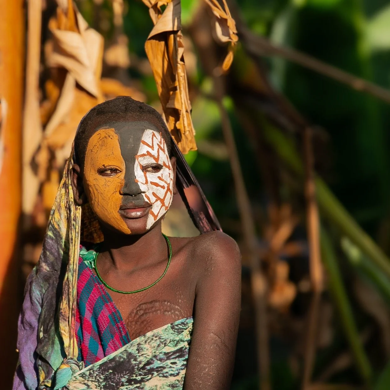 A stunning example of the body paint and scarification on a young girl from the Suri tribe in Southern Ethiopia. Scarification here is a form of strength and beauty, they show the scars off with great pride. Our trips to Ethiopia take you beyond the 