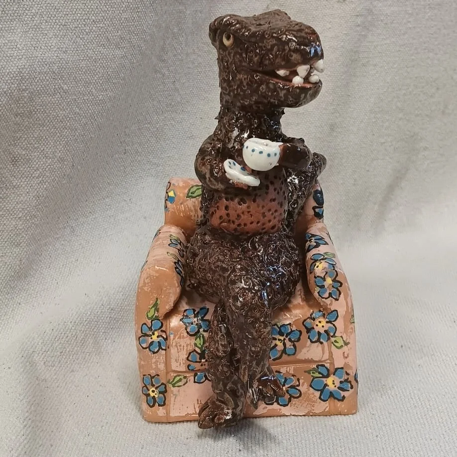Tea Rex, white and red earthenware clay, fired to cone 05 (on display at Commonwheel Gallery, Holiday market, Nov-Dec 2026)