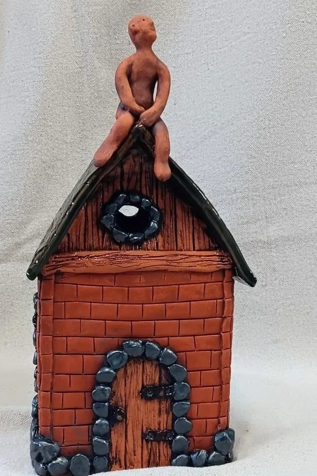 On the roof, red earthenware clay, fired to cone 05