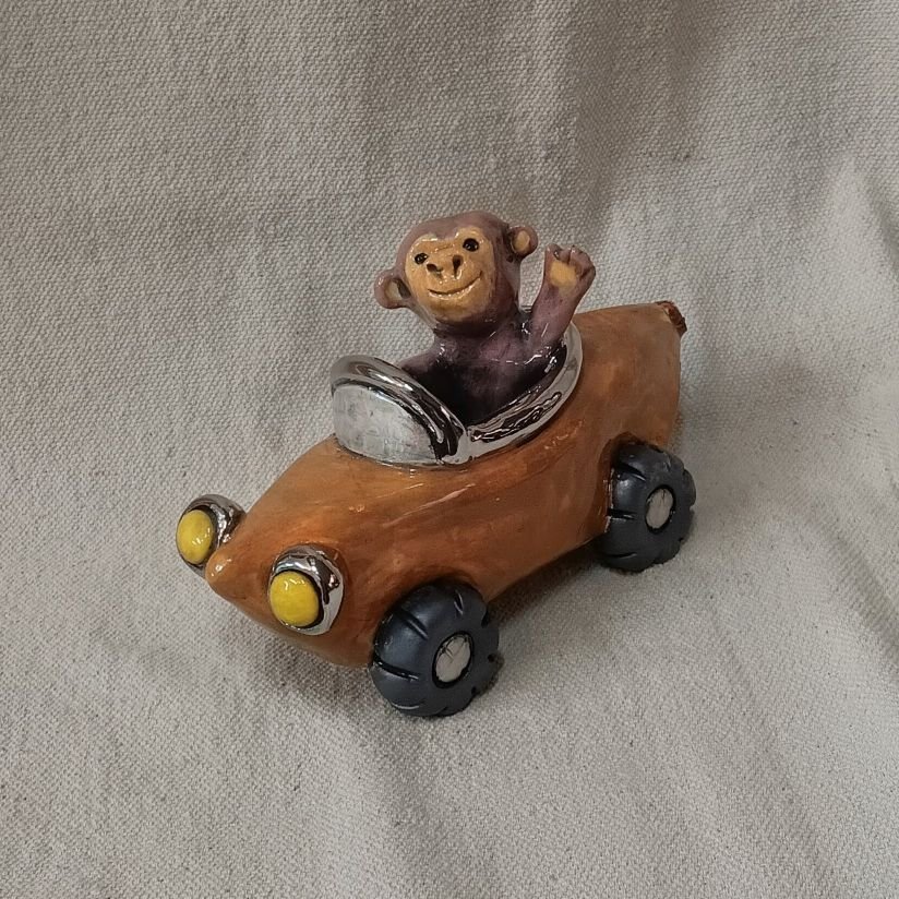 Richard Scarry banana car, white clay with platinum luster, fired to cone 05