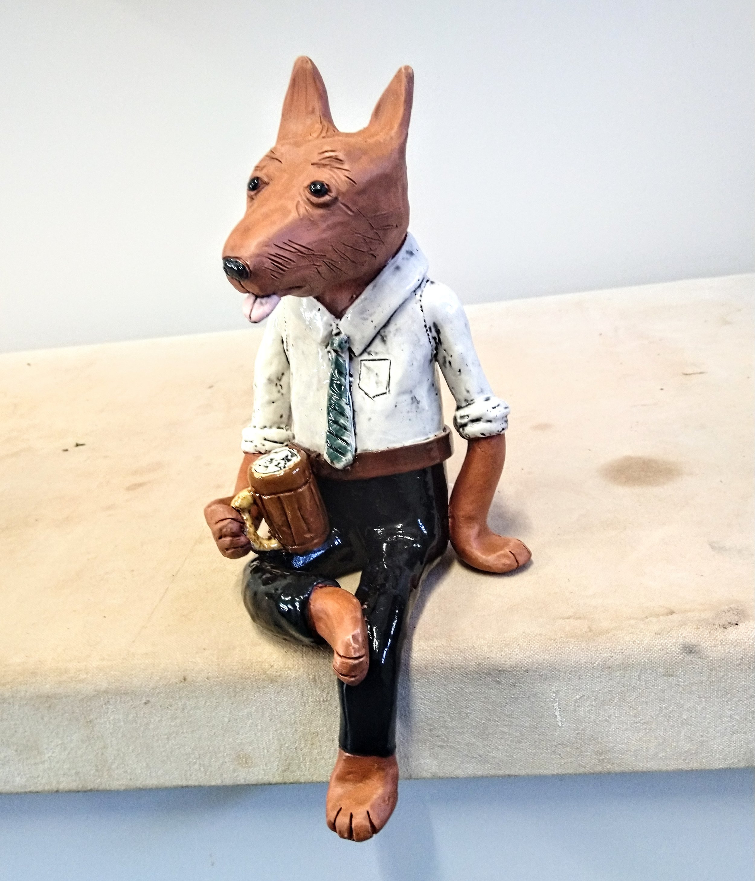 | SOLD | “Dog Tired” red earthenware clay, cone 05