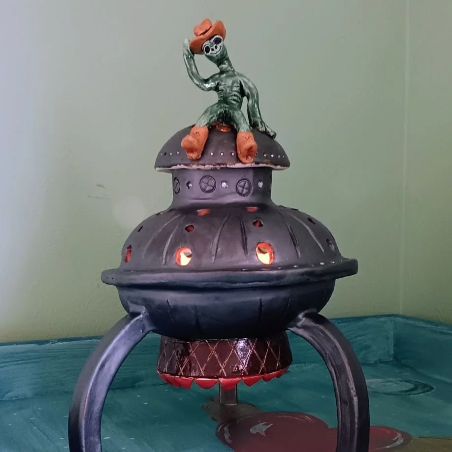 (sold) Space cowboy and saucer, white earthenware clay, fired to cone 05