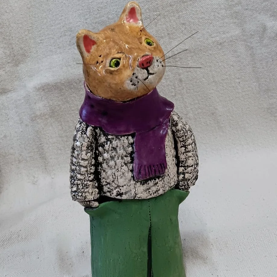 Cat in pants, white earthenware clay, fired to cone 05