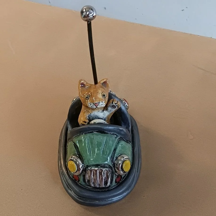 Bumper car kitty, white earthenware clay, fired to cone 05, white gold luster