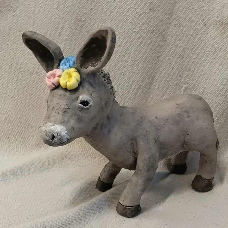 Flowered donkey, grey and white earthenware clay, fired to cone 05