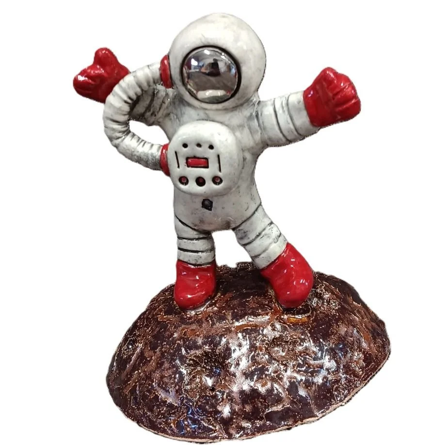 |sold| Dancing spaceman, white clay with platinum luster, fired to cone 05