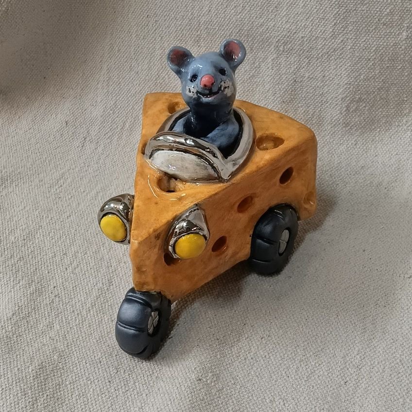 Richard Scarry cheese car, white clay with platinum luster, fired to cone 05