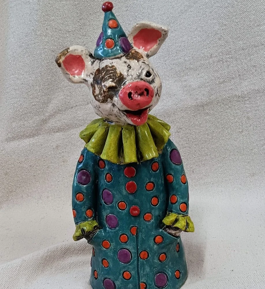 Pig in pants, white earthenware clay, fired to cone 05