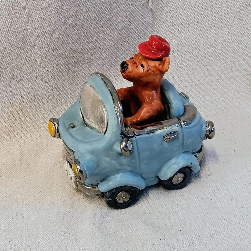 |SOLD| bear in a car, white earthenware clay, fired to cone 05, white gold luster