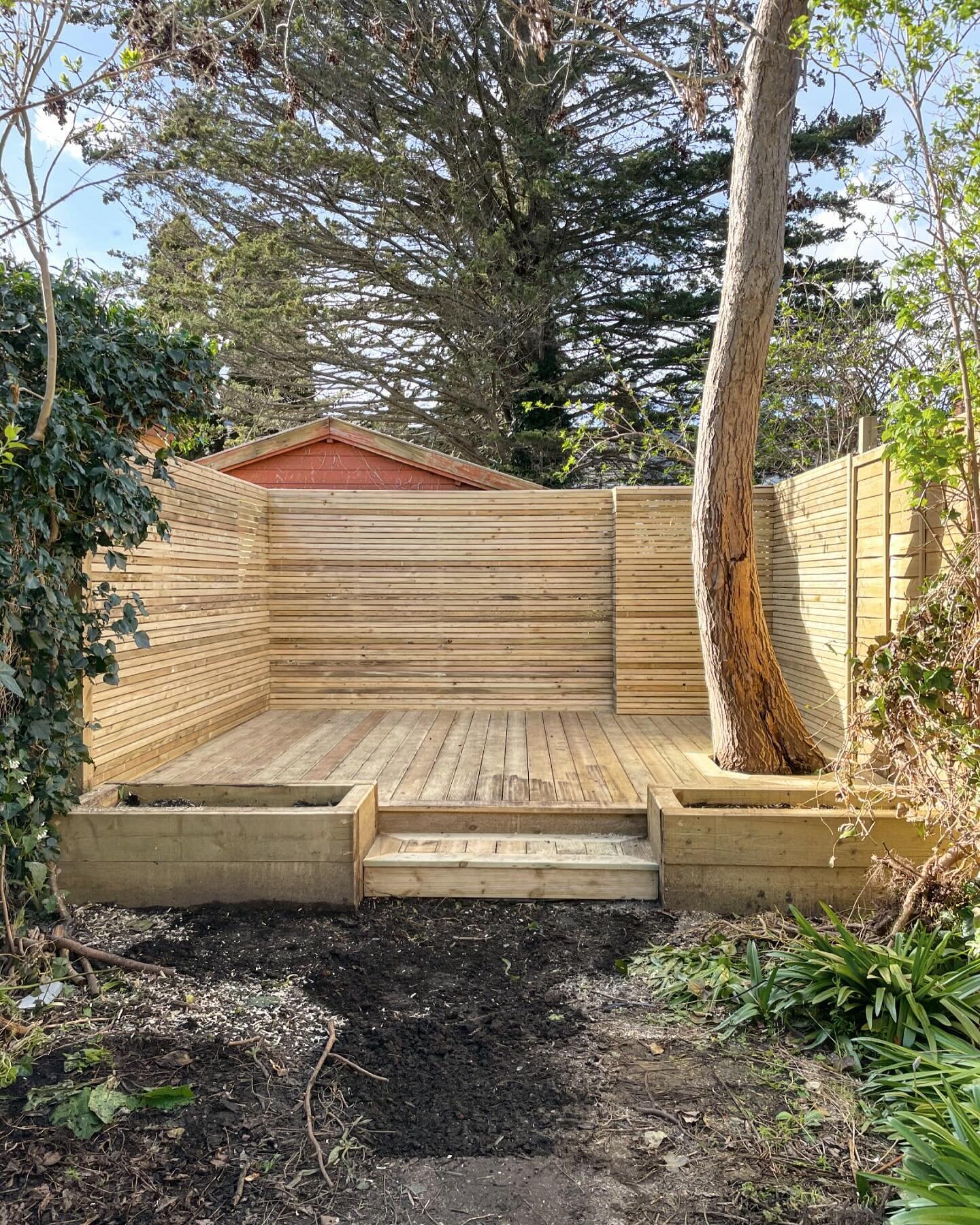 Deck, raised beds and privacy screening. Ready for a wash and some planting.