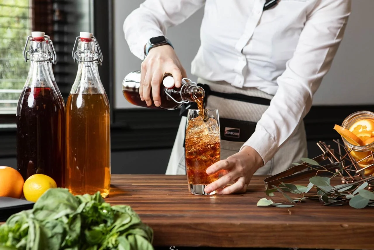 university-club-tempe-bartender-pouring-iced-tea-cocktail.jpg
