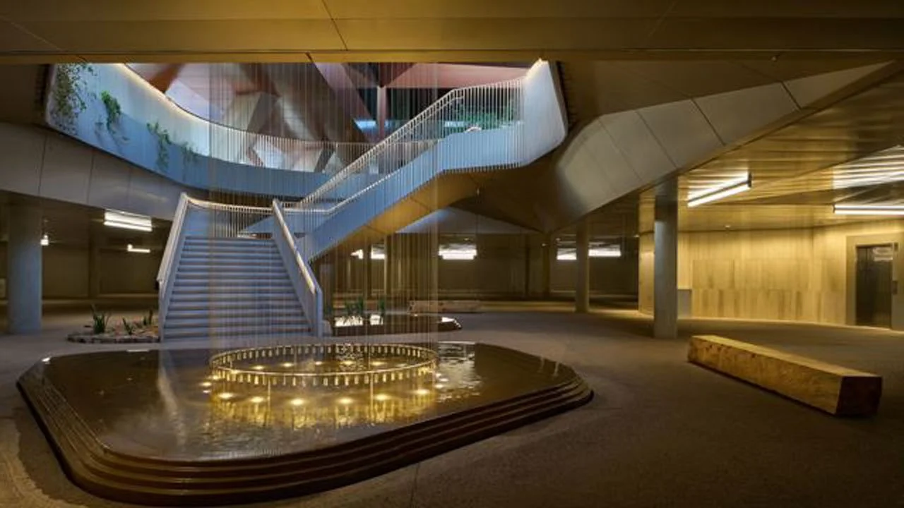 helios-education-campus-interior-lobby-fountain-staircase.jpg