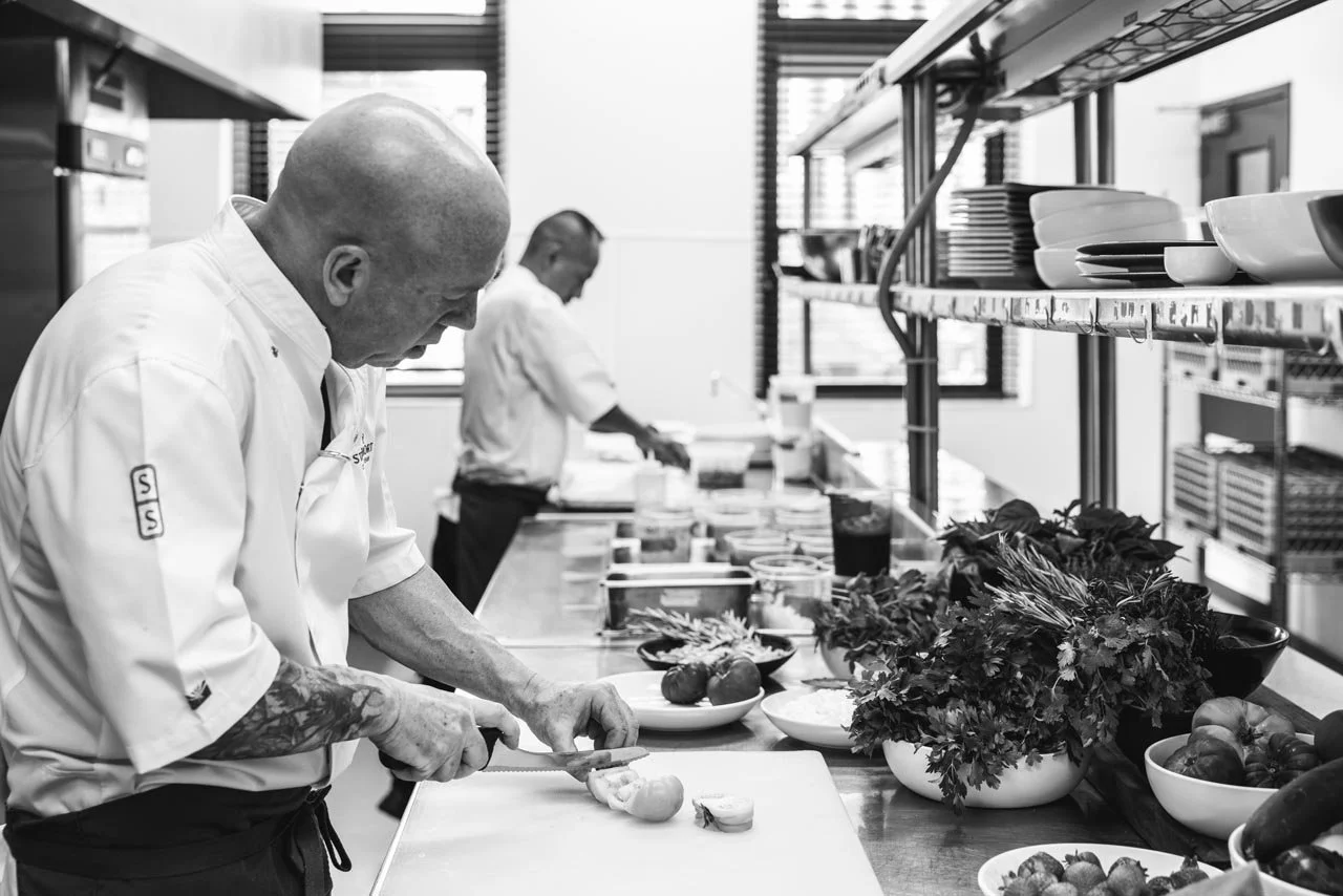 university-club-tempe-chef-prepping-food-kitchen.jpg