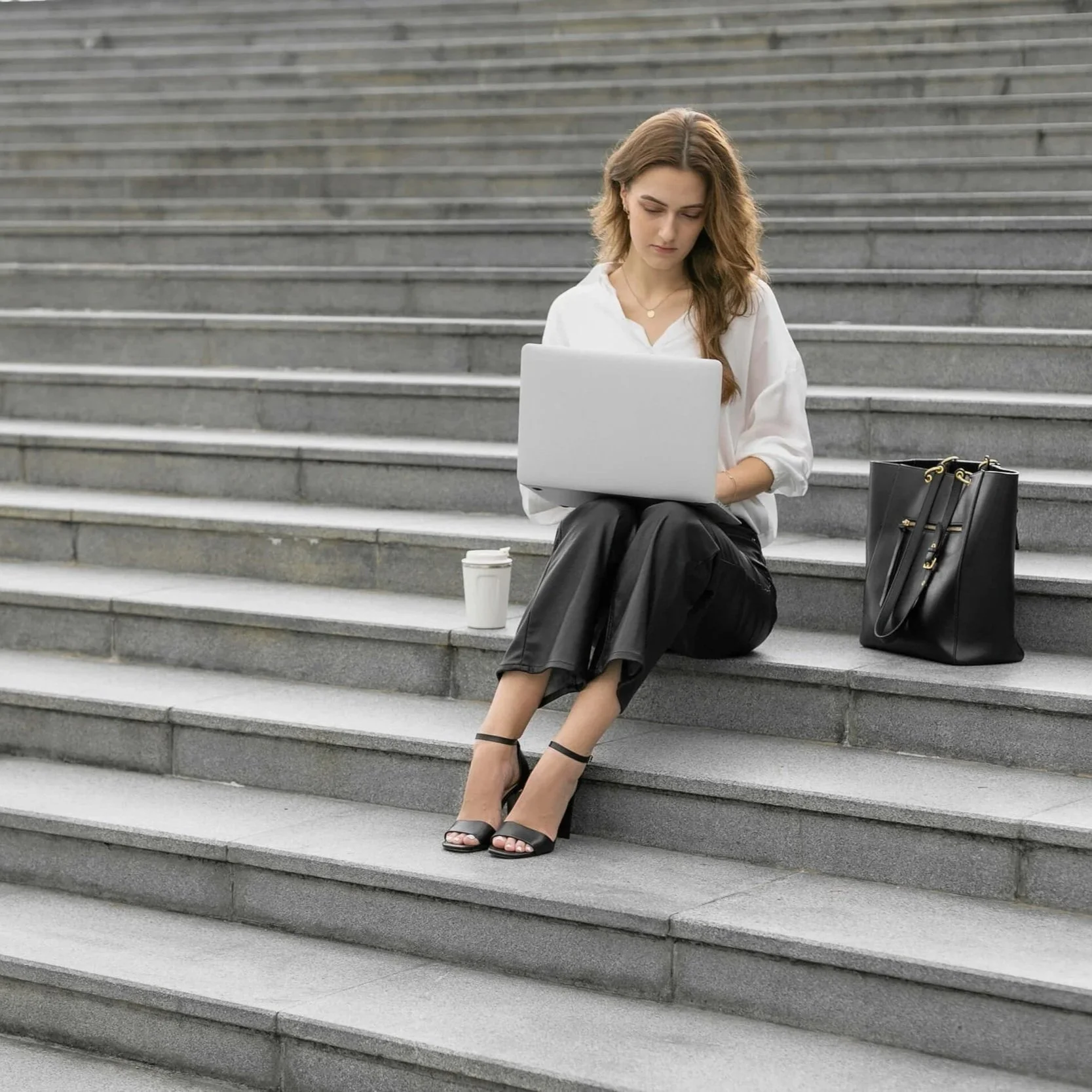 A lawyer continuing to work outside the courthouse, illustrating how burnout in high-achieving professionals often shows up as relentless over-functioning.
