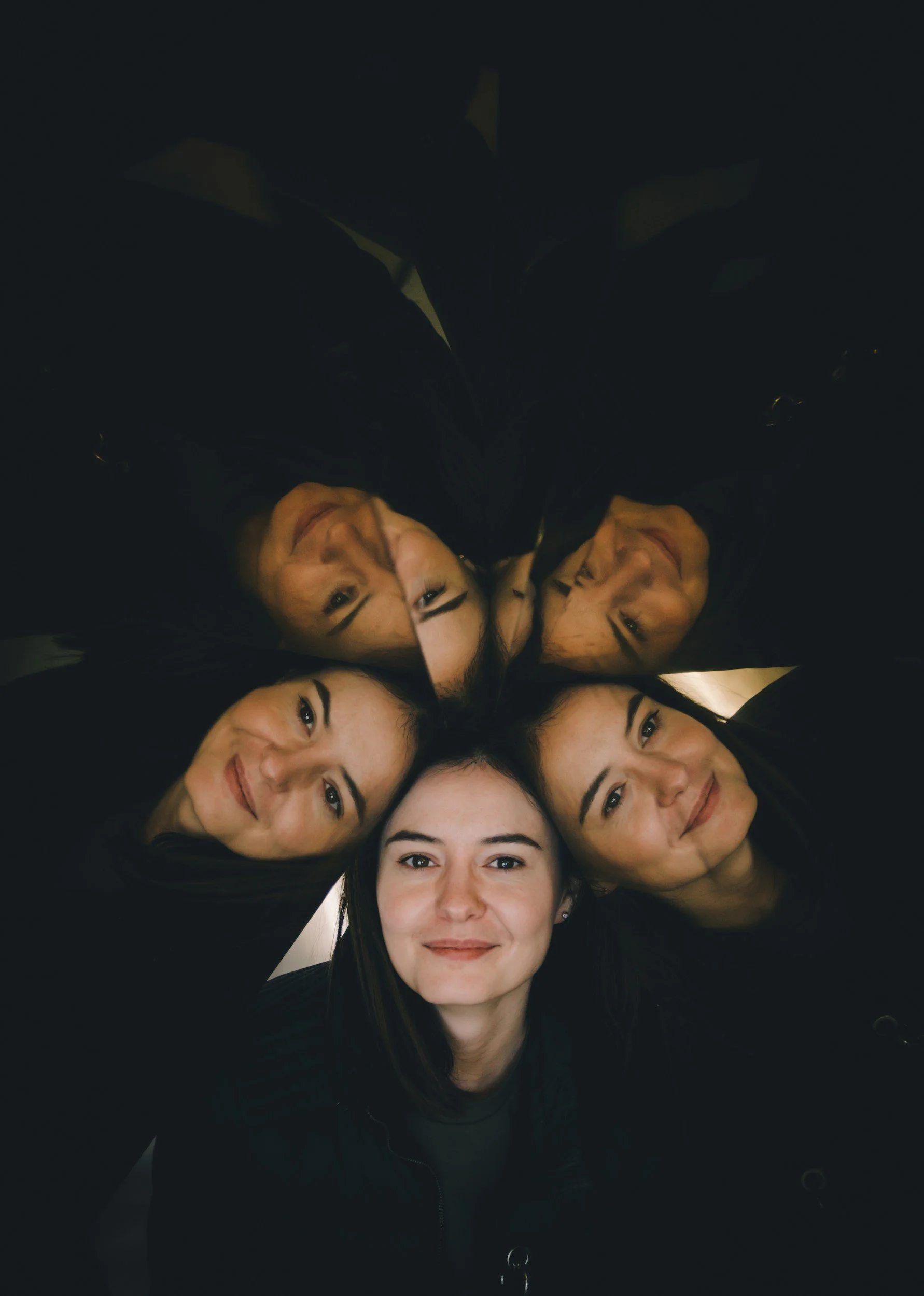 Person in a mirror reflection pattern representing Enneagram growth and integration through holistic therapy in California