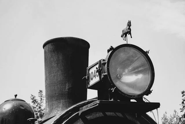 a black and white image of a train,  representing the future possibility of AI and human therapists working together in mental healthcare