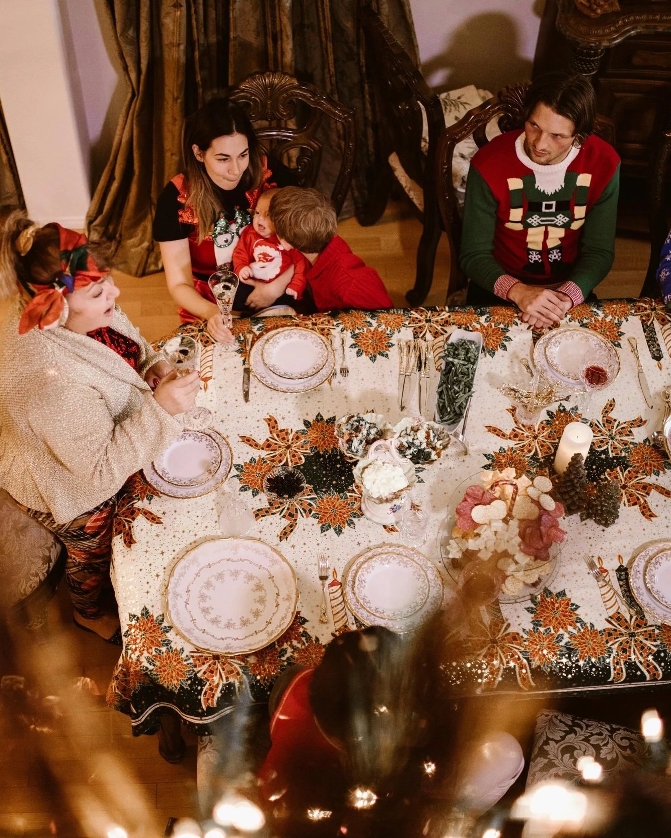A woman looking overwhelmed in a loud and chaotic environment, representing how family gathering anxiety can connect to older nervous system patterns that EMDR therapy helps resolve
