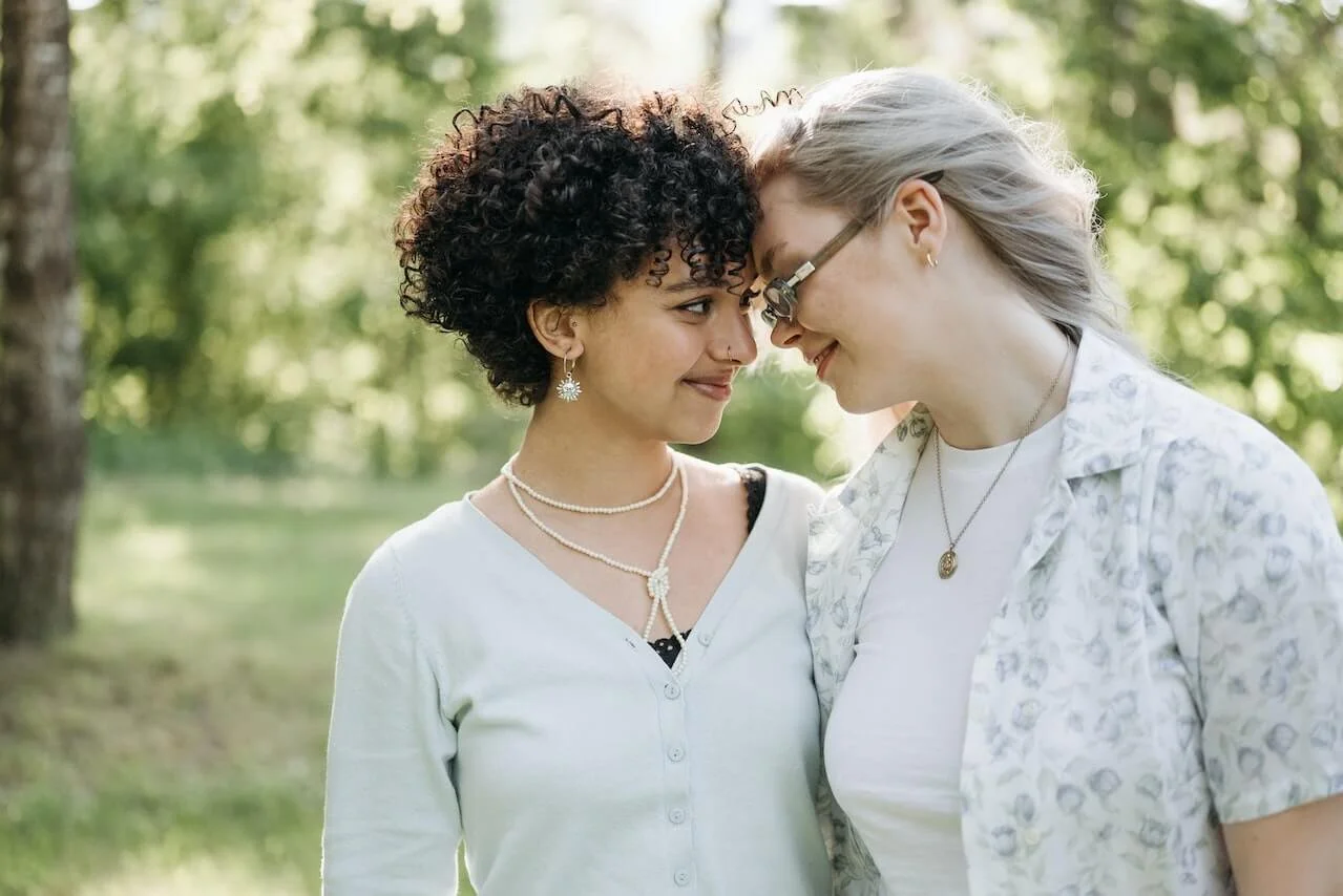 Two people sharing a calm, grounded moment together, representing the real intimacy possible when relationships are built slowly and safely through LGBT-affirming therapy