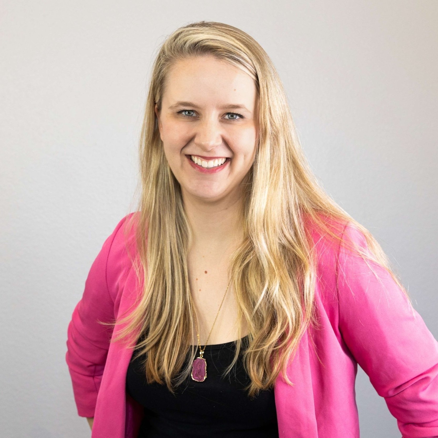 Laurel van der Toorn, LMFT, smiling in a pink top