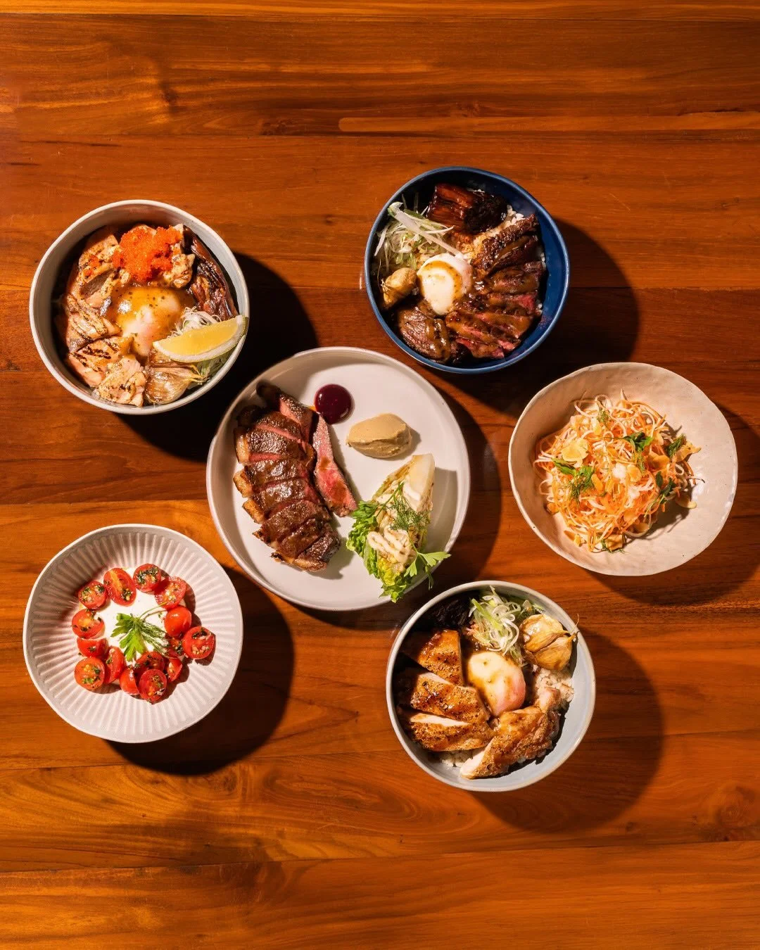 The whole lineup, no filter needed. 🍚 @nicerice.sg has been holding it down at Moonstone and we had to show you everything up close. Garlic butter rice, roasted eggplant, garlic confit, and all five proteins &mdash; this is what weekday lunch looks 