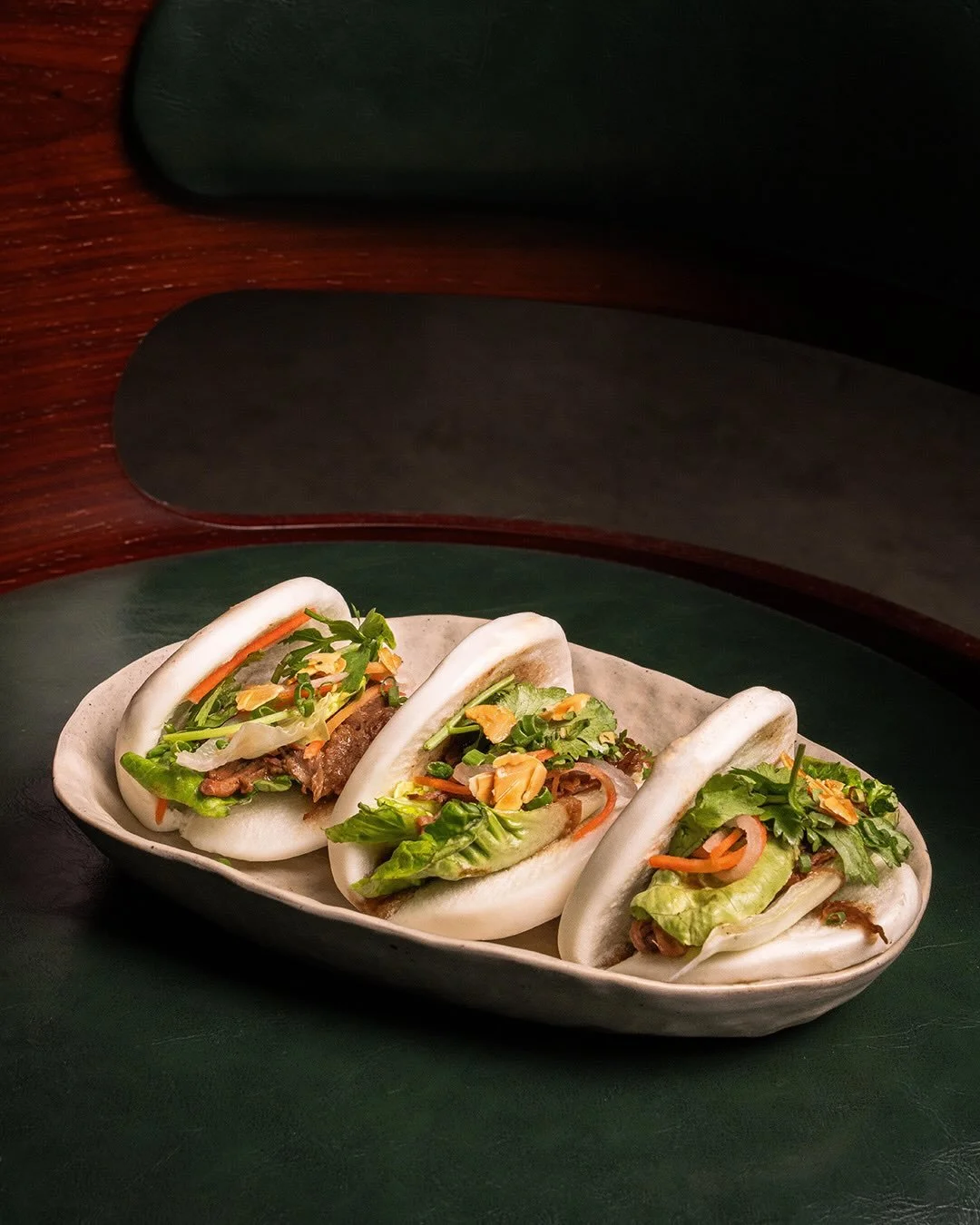Gubak Kia Continues At Night.

The gloss on the dumplings.
The steam off the bao.
The crunch from the kueh pie tee.

Soft buns, messy hands, someone already reaching for the next one before the plate&rsquo;s even cleared.

Now available for dinner.
A