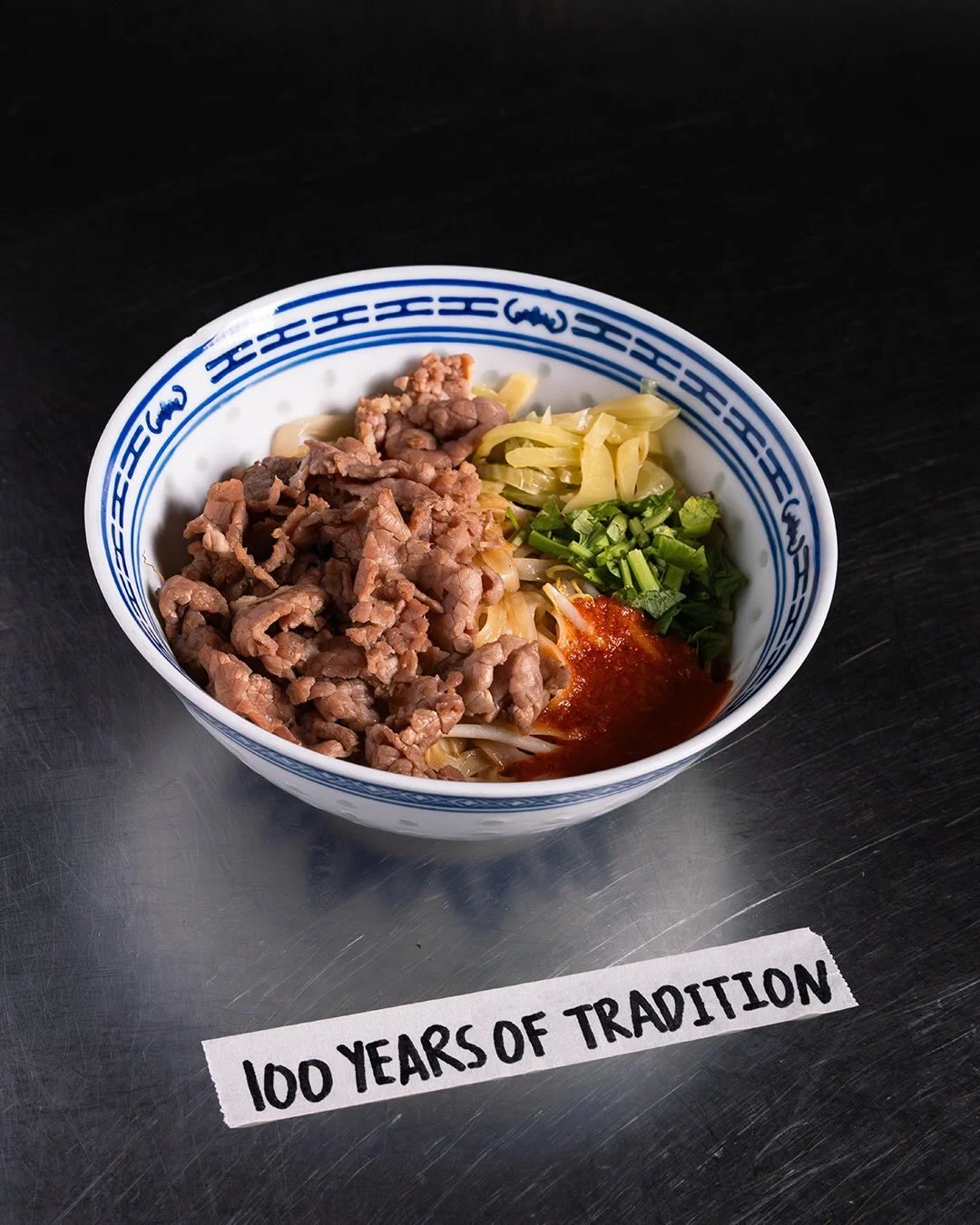 Over 100 years in the making.

Dry Mixed Beef Kway Teow has never really been about just one cut.

Tender slices.
Tripe.
Beef balls.
Braised pieces.

Different textures, different depths of flavour &mdash; all sitting in the same bowl.

For an extra 