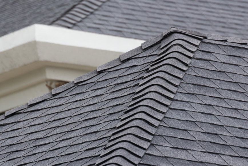 architectural asphalt shingles on modern residential roof