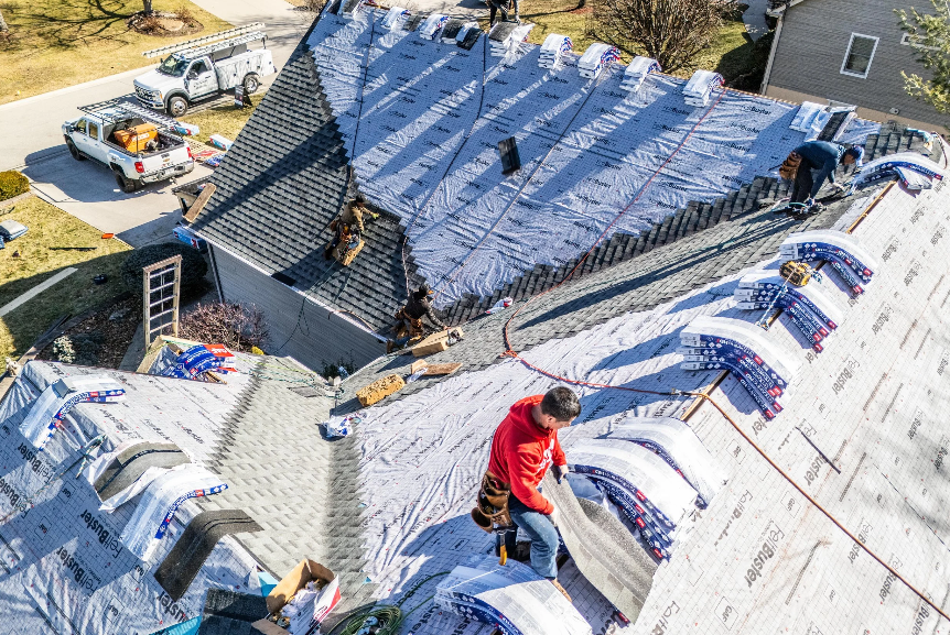 different roofing materials including asphalt shingles and metal roofing for cost comparison