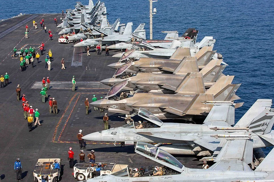 Aircraft on the flight deck of aircraft carrier in support of Operation Epic Fury
